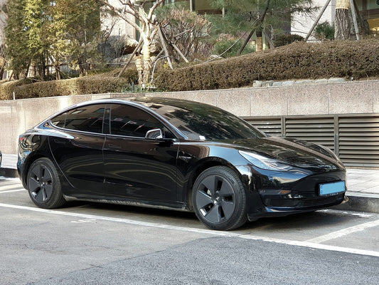 Derfor knirker bærearmene på din Tesla Model 3